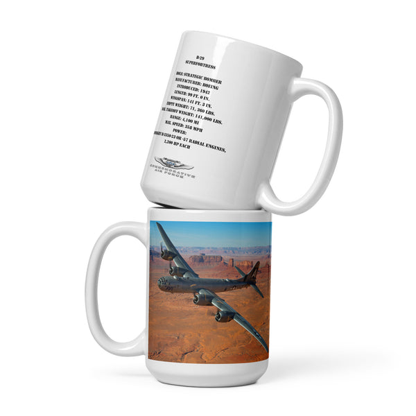 A white ceramic coffee mug with an image of the B-29 Superfortress 'FIFI' in flight over a landscape, and text detailing the product information.