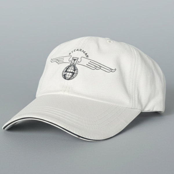 White cap with a logo on a black office chair