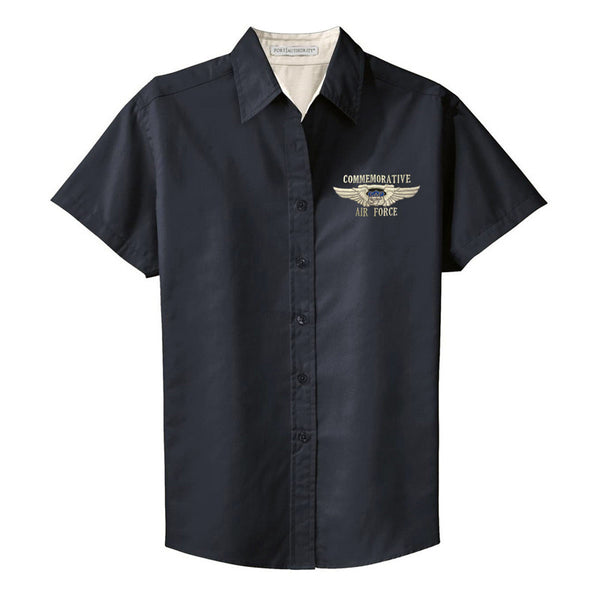 A navy short sleeve button-down shirt with a 'Commemorative Air Force Wings' insignia on the left breast.